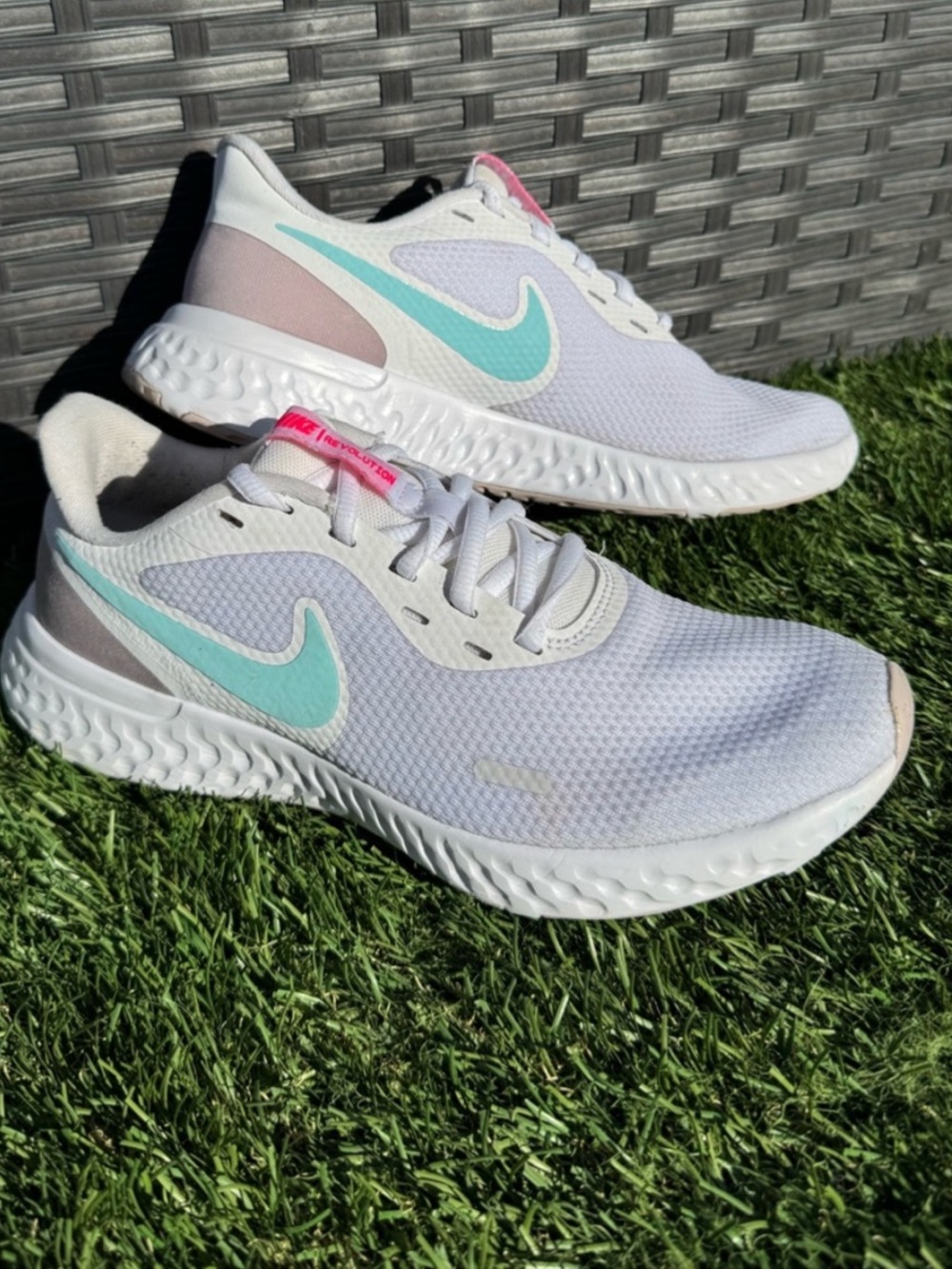 7 Nike Revolution 5.0 Women’s running white and teal.